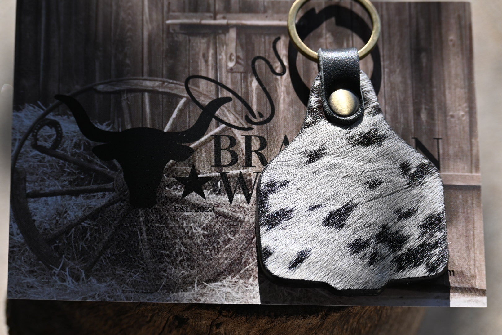 Leather cow hot sale tag keychain