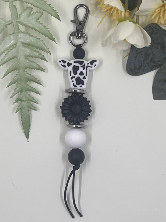 Cow Head Keyrings # 4 - Black and White with Flower