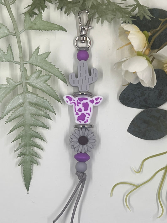Cow Head Keyrings # 12 - Purple with Grey Cactus and Grey Flower